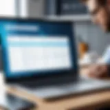 An office worker reviewing time sheets on a laptop